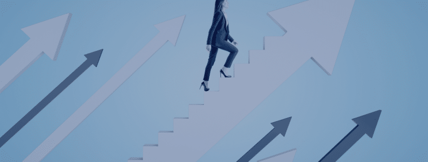 A professional woman ascending a staircase of success with upward-pointing arrows, symbolizing strategic career advancement as discussed in Measured Ability's blog post on maximizing career growth for job seekers.