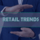 Man in a suit presenting 'RETAIL TRENDS' concept, signifying innovative retail staffing strategies for e-commerce and brick-and-mortar stores in South Africa