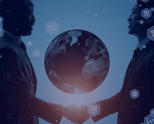 Two business professionals shaking hands in silhouette with a digital globe in the background, symbolizing the global impact of sustainable recruitment practices.