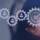 Gears with employee icons and a checkmark symbol, representing the benefits of accurate payroll services for employees