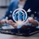 Businessperson using a tablet with recruitment and target icons hovering above, symbolizing how a recruitment agency supports H2 hiring goals