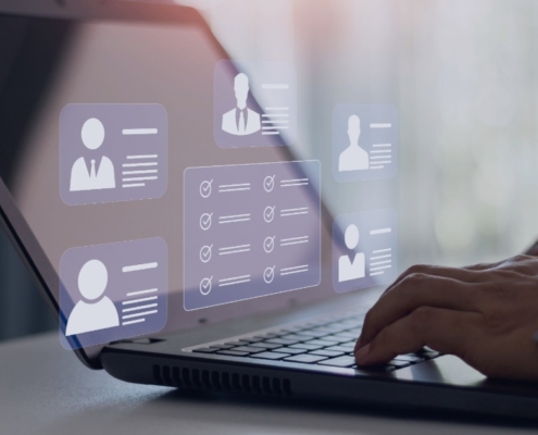 Recruiter reviewing candidate profiles on a laptop, illustrating common mistakes that prevent recruitment agencies from contacting job seekers in 2026.